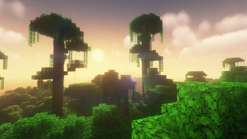 Uma selva em Minecraft, com duas árvores enormes emergindo da vegetação.
